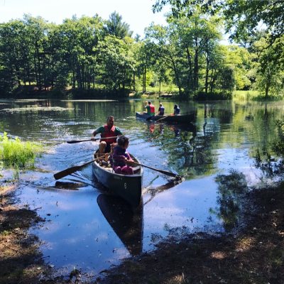canoes on pond